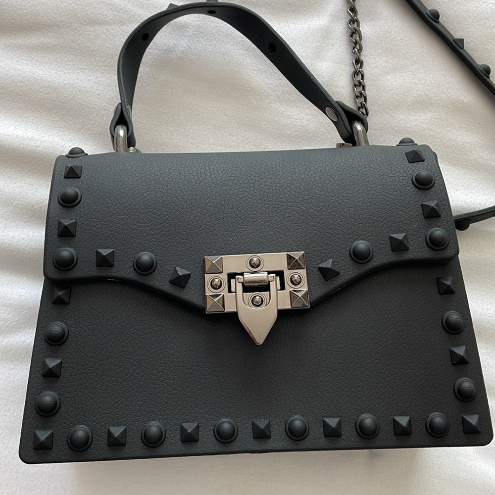 Black purse with studded detail